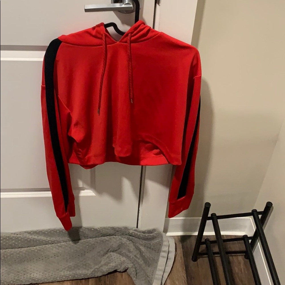 Red crop top hoodie with black side stripes